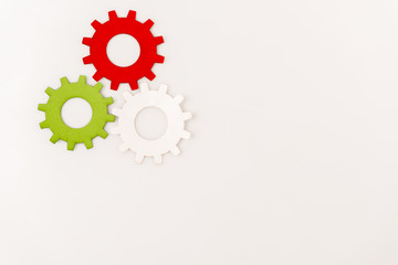 top view of colorful gears isolated on white