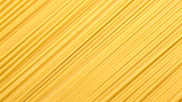 Spaghetti noodles in a circular motion. closed