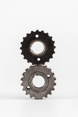 metal round gears on white background