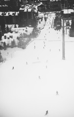 Vail, Colorado / United States - December 25th, 2016: Skiers descend to the Vail ski village.