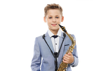 Fototapeta premium little boy with a saxophone