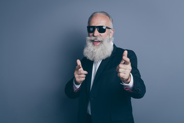 Close-up portrait of his he nice attractive trendy content cheerful cheery cool gray-haired man macho pointing two forefingers take pick you isolated over dark grey pastel color background - obrazy, fototapety, plakaty