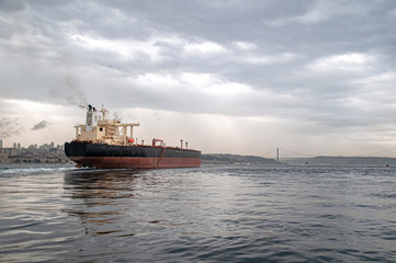 Cargo ship carrying oil passing through the Bosphorus.