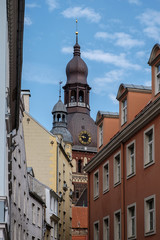 Cathedral in the old city. Narrow street in Riga.