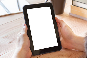 man hand using tablet computer on workplace
