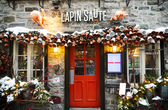 Quebec, Canada - December 21, 2016: Restaurant  Lapin Saute on Rue du Petit-Champlain at 21 December, 2016 in Quebec City, Quebec, Canada. Historic District of Quebec City.