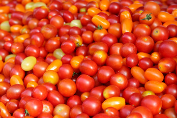 mini cherry tomatoes at a market stall