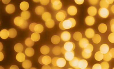Obraz premium Abstract blur golden bokeh light Christmas holiday background