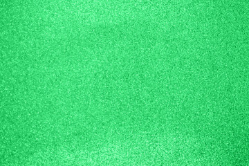 Abstract blur green glitter sparkle defocused bokeh light background