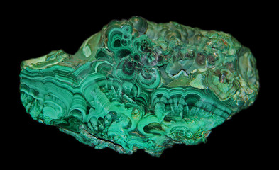 natural gemstone ural malachite on black background