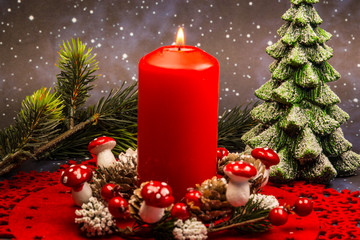 Advent wreath with burning candle