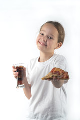  young girl eating pizza and drinking an ice drink