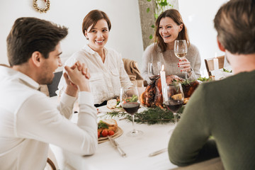 Happy big family celebrating Christmas together at home