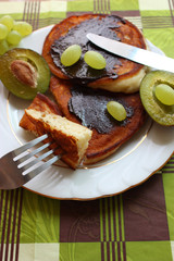 tasty pancake with chocolate and  avocado on the table
