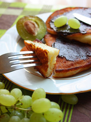 tasty pancake with chocolate and  avocado on the table