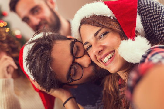 Couple taking a selfie on Christmas day