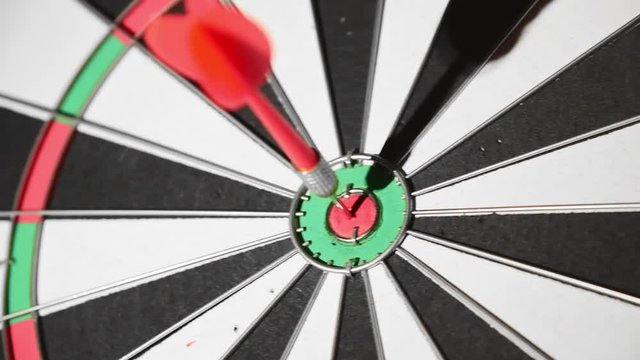 Throwing darts in the target, missing target, target marketing concept.