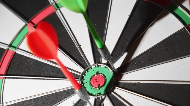 Throwing darts in the target, missing target, target marketing concept.