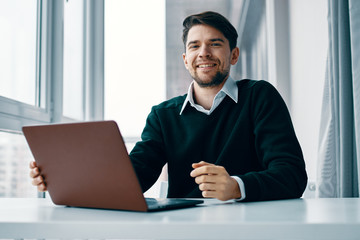 businessman working on his laptop in office