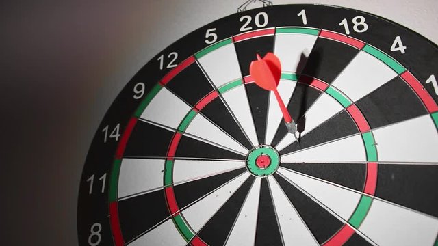 Throwing darts in the target, missing target, target marketing concept.