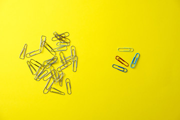 The idea of individuality, concept, metal paper clips
