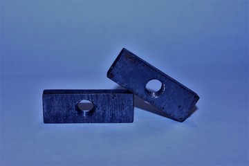 Two iron parts with holes and thread. Moscow. Russia.