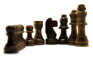 Conceptual photo of chess pieces. Chess as people. White isolated background.