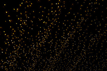 Defocused lights blurred abstract gold color background