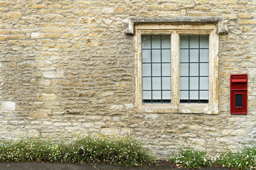 Vintage window on the old wall