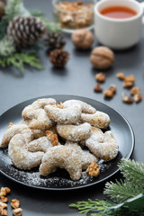 Christmas butter homemade cookies on dark background. Selective focus, effect toning.