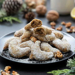 Christmas butter homemade cookies on dark background. Selective focus, effect toning.