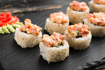 Delicious rolls with fish and cheese	