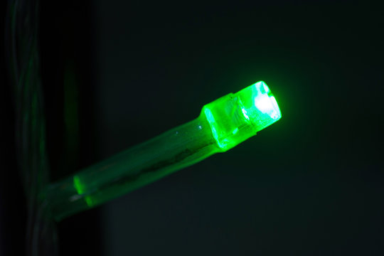 Close Up Of Green Led Light Against Black Background