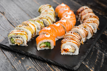 Delicious rolls with fish and cheese	