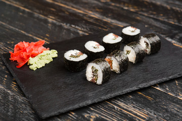 Delicious rolls with fish and cheese	