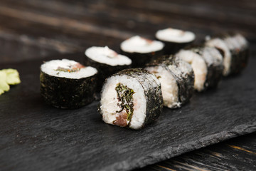 Delicious rolls with fish and cheese	