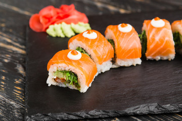 Delicious rolls with fish and cheese	