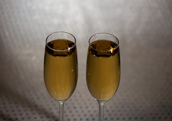 Drink. Two glasses white wine, light background