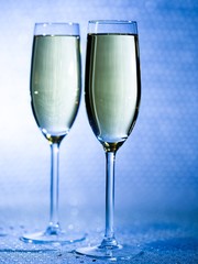 Drink. Two glasses white wine, light background