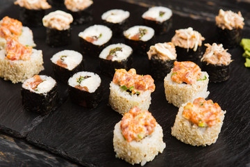 Delicious rolls with fish and cheese	