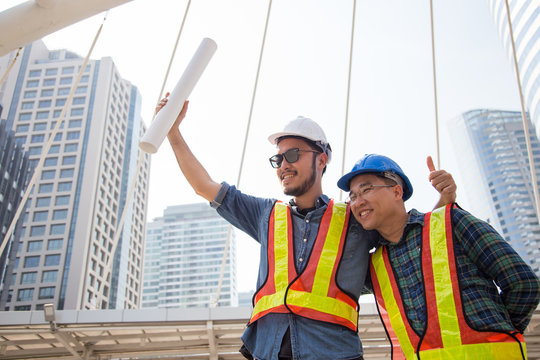 Engineering construction teamwork concept : Engineer happy for the job success,engineer congrate for working success.