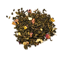 Green tea with aromatic additives. Top view on white background