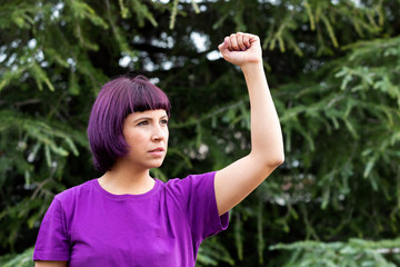 Woman with her fist held high