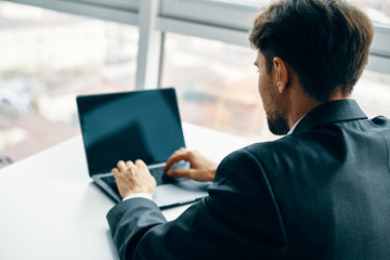 man with tablet computer in the city