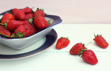 fresh strawberries in a bowl on the table