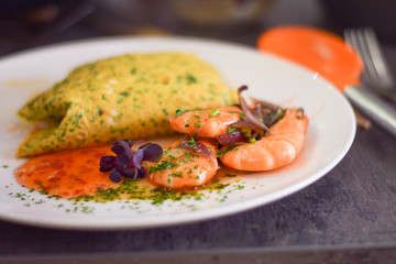 Prawn and omellete with chilli sauce dish
