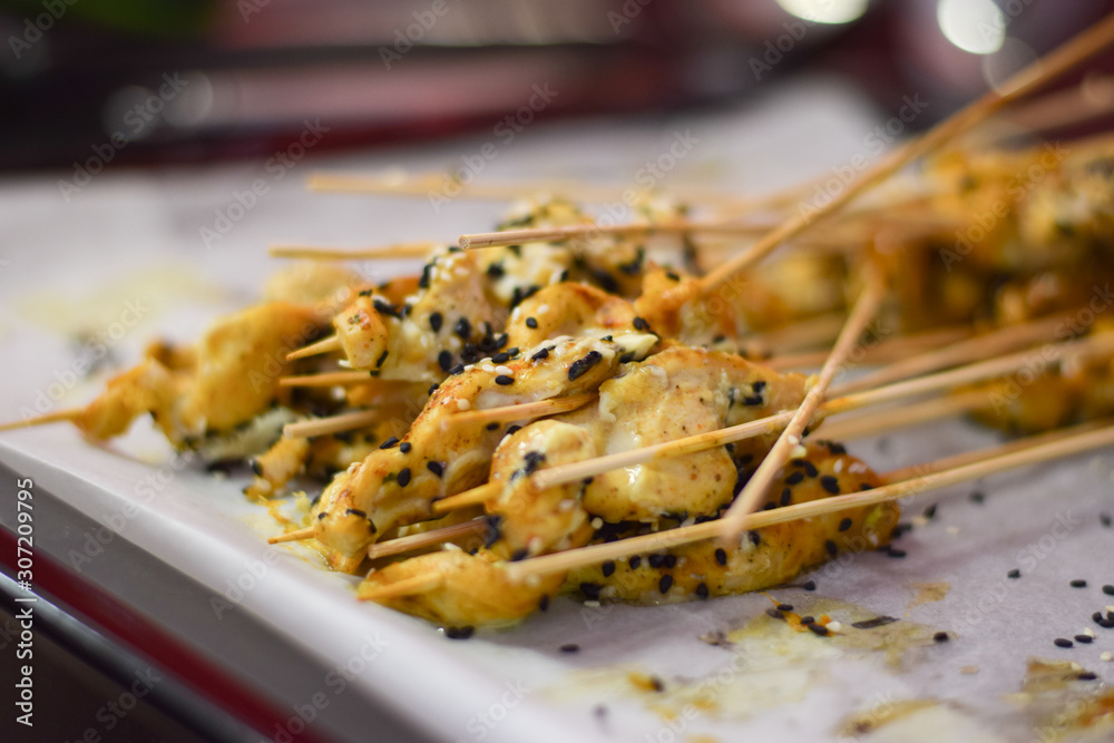 Wall mural chicken skewers on the baking tray