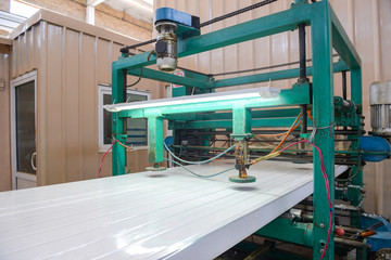 Press machine glutes panel. Plant for the production of sandwich panels from styrofoam