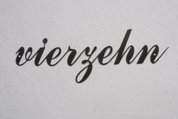 number of stainless steel in handwriting, german language, black,