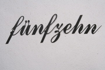 number of stainless steel in handwriting, german language, black,